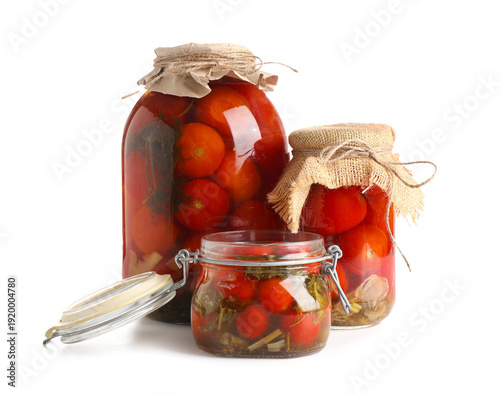 Glass jars with canned toma...