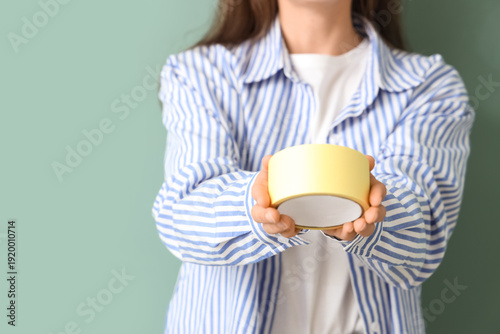 Young woman with adhesive t...