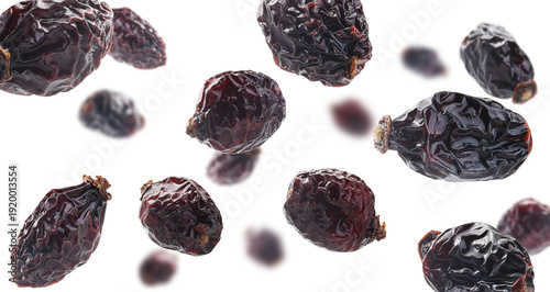 Vászonkép Dried rosehip berries levitate on a white background