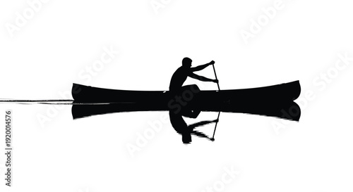 Man rowing canoe silhouette on water