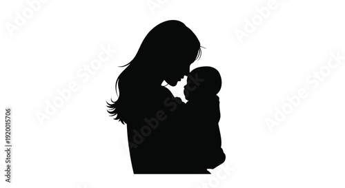 Mother lovingly cradling a baby a poignant family moment silhouette