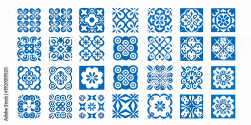 Collection of ornate blue and white patterned ceramic tiles arranged in a grid