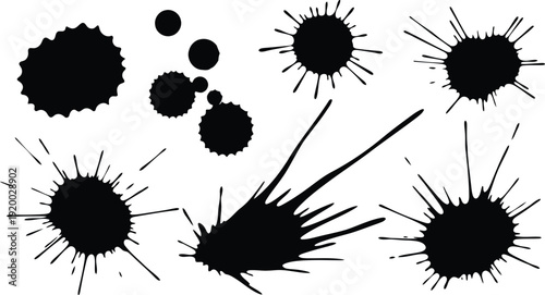 black splatters and ink blots on white background