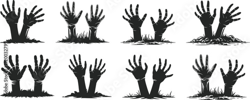 Collection of zombie hands silhouettes reaching out from the ground with grass and soil representing graveyard, horror, Halloween, undead, apocalypse, and death.