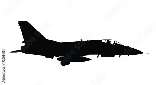 A sleek dark silhouette of a military jet in flight silhouette