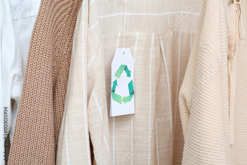 Clothes with recycling tag ...