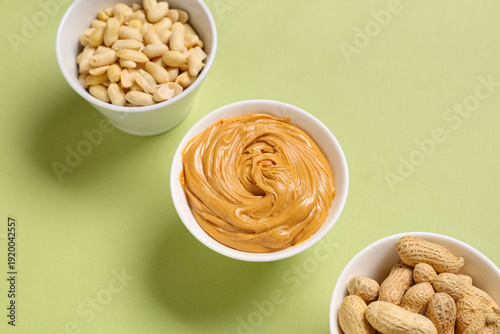 Bowls with nuts and tasty p...