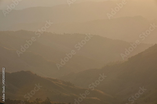 Scenic view of warm light evening during sunset over mountain