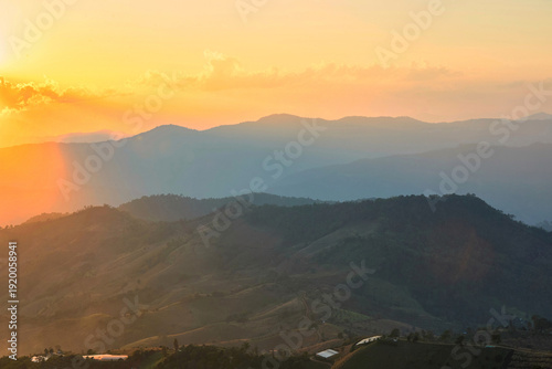 Scenic view of warm light evening during sunset over mountain