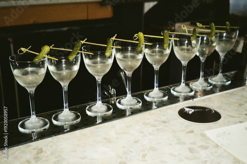 Wallpaper Mural Row of martinis garnished with pickles on bar counter Torontodigital.ca