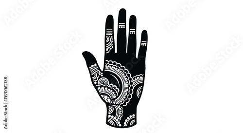 Intricate henna design on a hand a striking black silhouette