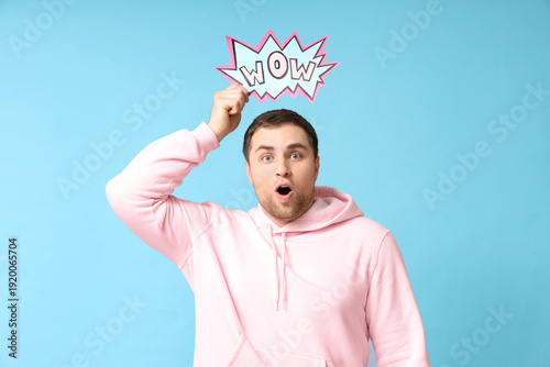 Shocked young man with text...