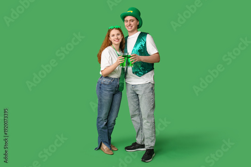 Young couple with beer on g...