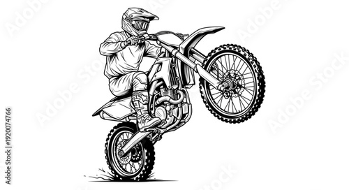 Motorcyclist performing a wheelie on a dirt bike.