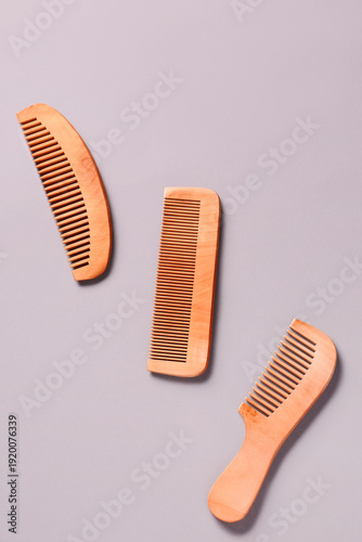 Hair wooden combs on grey b...
