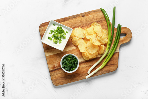 Bowls of tasty sour cream w...