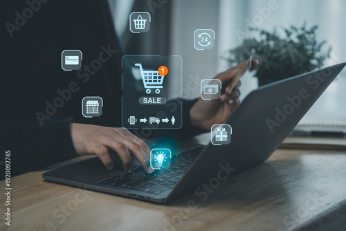 Person Using Smartphone and Laptop for Online Shopping with Sale Notifications and Digital Icons Presenting E-commerce and Technology Concepts