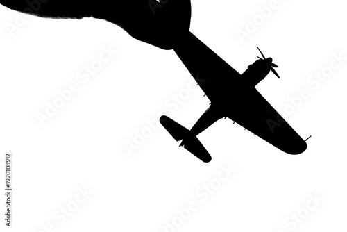 指でつままれたシルエットのプロペラ戦闘機