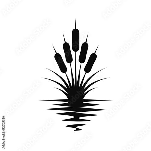 Black and white of cattails growing in water with ripples