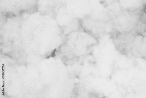 close-up texture of white cotton wadding or polyester fiber stuffing.