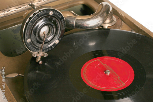 Vintage vinyl record player on a white background