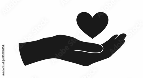 A hand gently holds a heart in a caring gesture of love and support.
