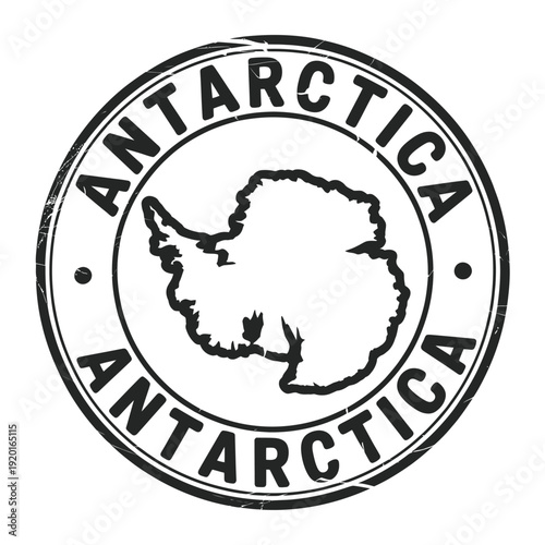 Circular stamp depicting the continent of antarctica with text