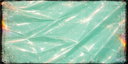 A grunge blue background with frozen ice texture and frost patterns on a cold winter surface creates a crystal design backdrop