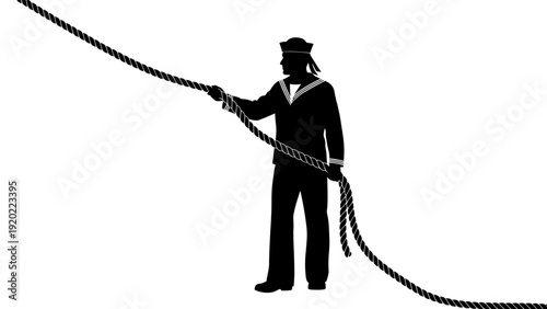 Silhouette of a sailor holding a thick rope.