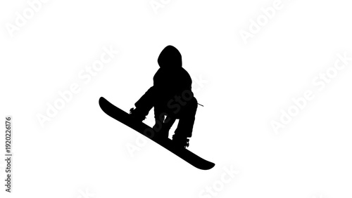 Silhouette of a snowboarder mid-air during a jump.