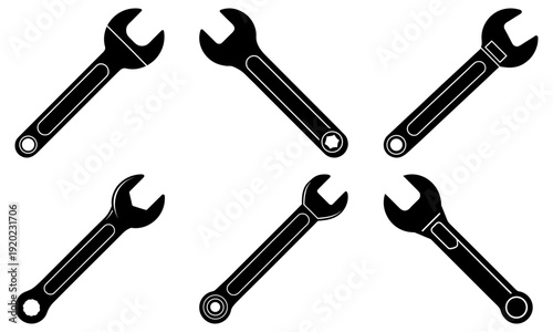 Six wrenches arranged in a circular pattern illustrating tools for maintenance and repair