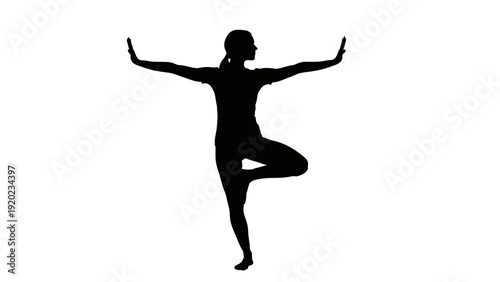 Silhouette of a woman performing a yoga tree pose with arms outstretched.