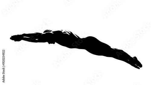 Silhouette of a male swimmer diving into water during a competition.