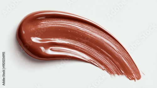 濃厚なブラウンのリップカラーの質感。化粧品や美容関連のイメージ素材。