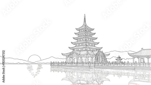 Traditional East Asian pagoda architecture reflected in calm water at sunrise