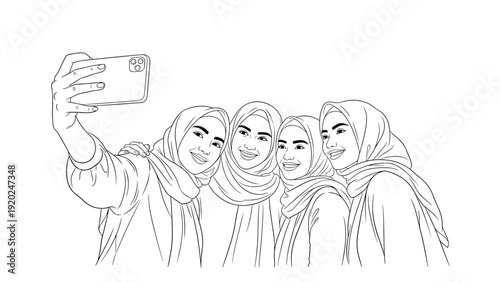 Four smiling Muslim women in hijabs taking a selfie together with a smartphone