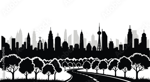 A silhouetted cityscape with trees and a winding road in the foreground