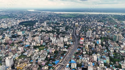 Wallpaper Mural Aerial Panorama of Dense Urban City with Elevated Highway 4K Torontodigital.ca
