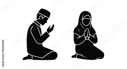 Praying woman in hijab with an open book dark silhouette