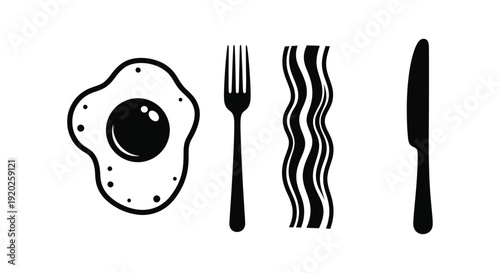 Breakfast items including fried egg bacon and spatula silhouette