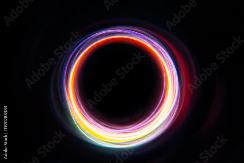 multicolored circular funnel on a black background