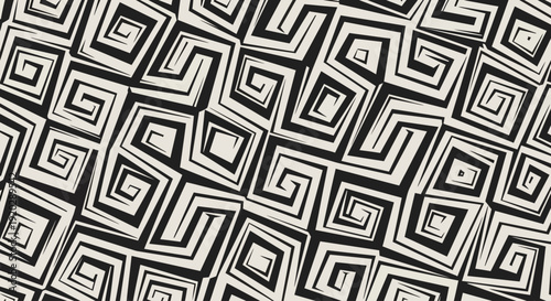Repeating geometric pattern of black and white diamond shapes in a seamless design viewed from directly above