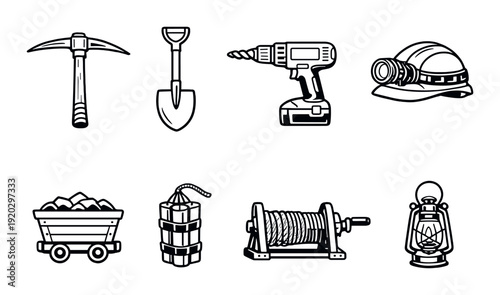 Mining tools and equipment arranged on dark background