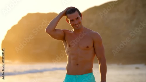 Confident man enjoying sunset beach walk in relaxed summer vibes