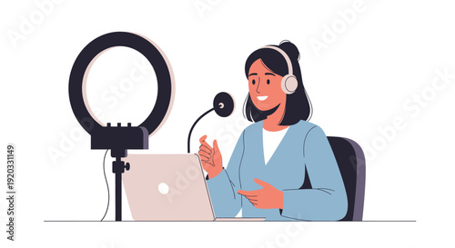 Young woman with headphones recording a podcast or video with a laptop and microphone, illuminated by a ring light, illustrating content creation and online communication