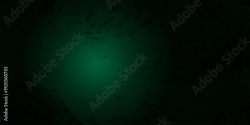 Dark Emerald Green Grunge Texture Background with Subtle Light Center, Rough Concrete Wall, Distressed Surface, Scratched Chalkboard Effect and Vintage Film Overlay