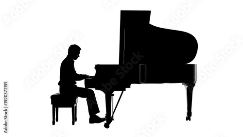 silhouette of a man playing piano