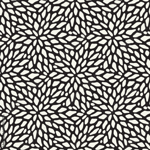 Vector seamless pattern. Fireworks tileable design. Stylish structure of natural spots. Abstract monochrome background. Can be used as swatch in Illustrator. Black-and-white spotty print.