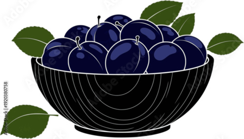 A wooden bowl filled with dark blue plums and green leaves on a white background
