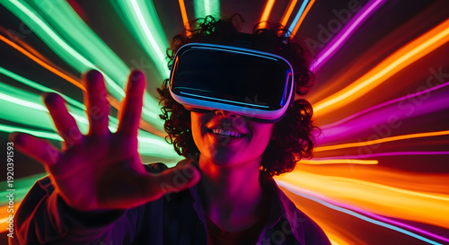 Person experiencing virtual reality with colorful light trails surrounding them